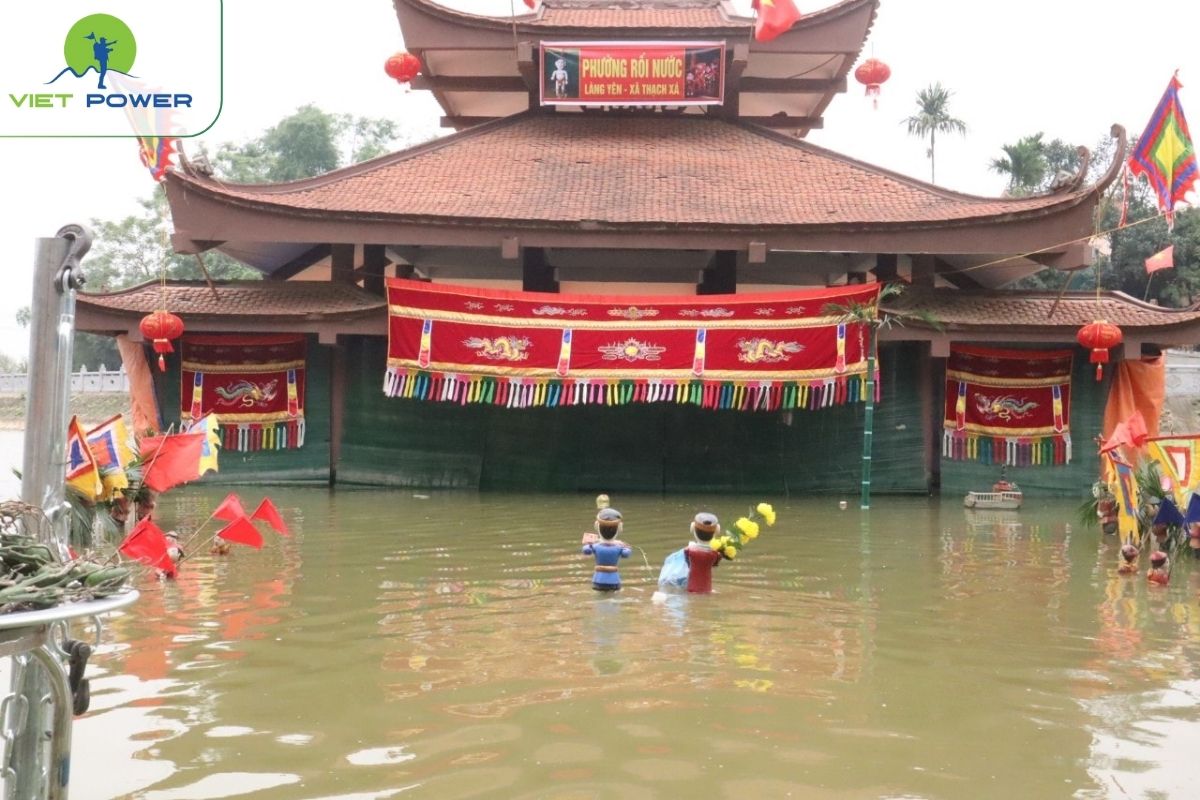 Watch water puppet show in Yen Duc village