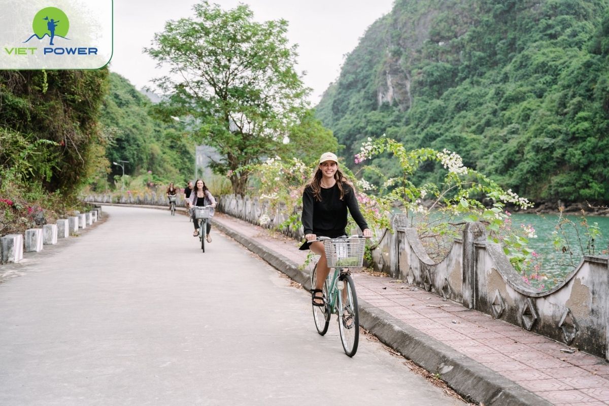  Cycling through village at Viet Hai Village.